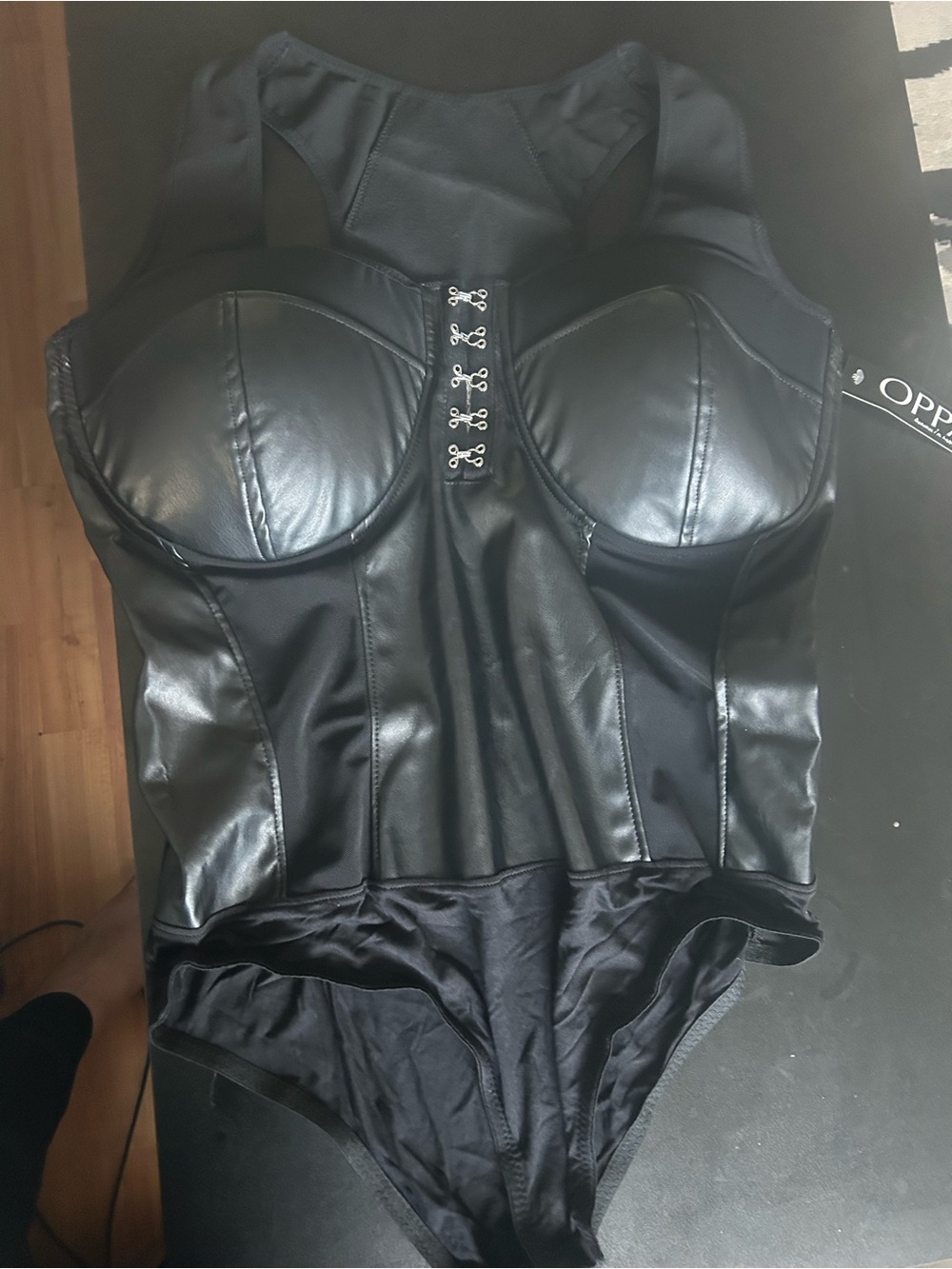 OPPOsuit Black Faux Leather Bodysuit with Hook Front